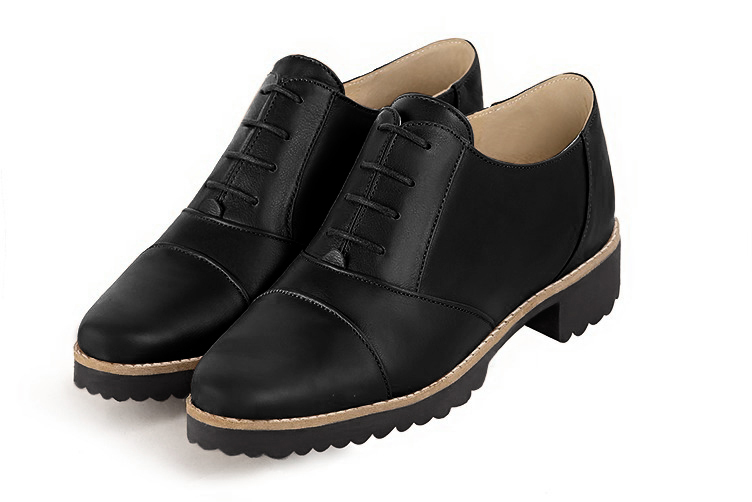 Satin black women's casual lace-up shoes. Round toe. Flat rubber soles. Front view - Florence KOOIJMAN